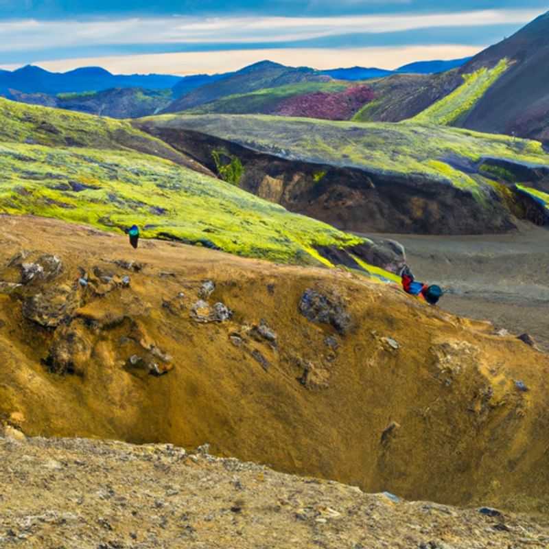 Four digital nomads traversing the vibrant hues of autumn in Iceland, embarking on an invigorating 4-day adventure through the enchanting landscapes of Laugavegur and Fimmvörðuháls.